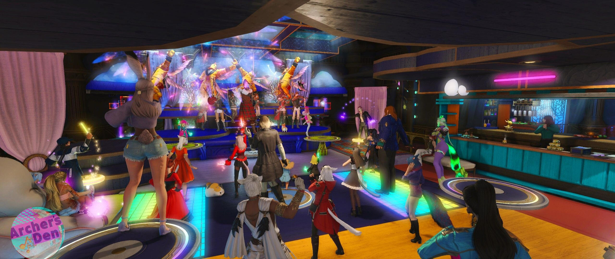 The Lassies performing on a stage in a pub with patrons